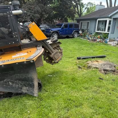 Triple B's stump grinder at work near a Central Indiana home and driveway